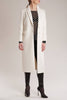 The coat is crafted from soft cashmere in a versatile and timeless white colour that will go with many outfits.
