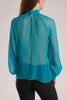 This blouse is cut from silk georgette and gathered at the collar. Wear it over a pair of trousers to show off the hem. 