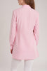  The light pink colour and a slim silhouette make this classic shirt a flattering piece.