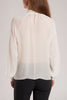 The silk chiffon blouse is gently gathered at the collar and has pearl button fastening at neck and cuffs.