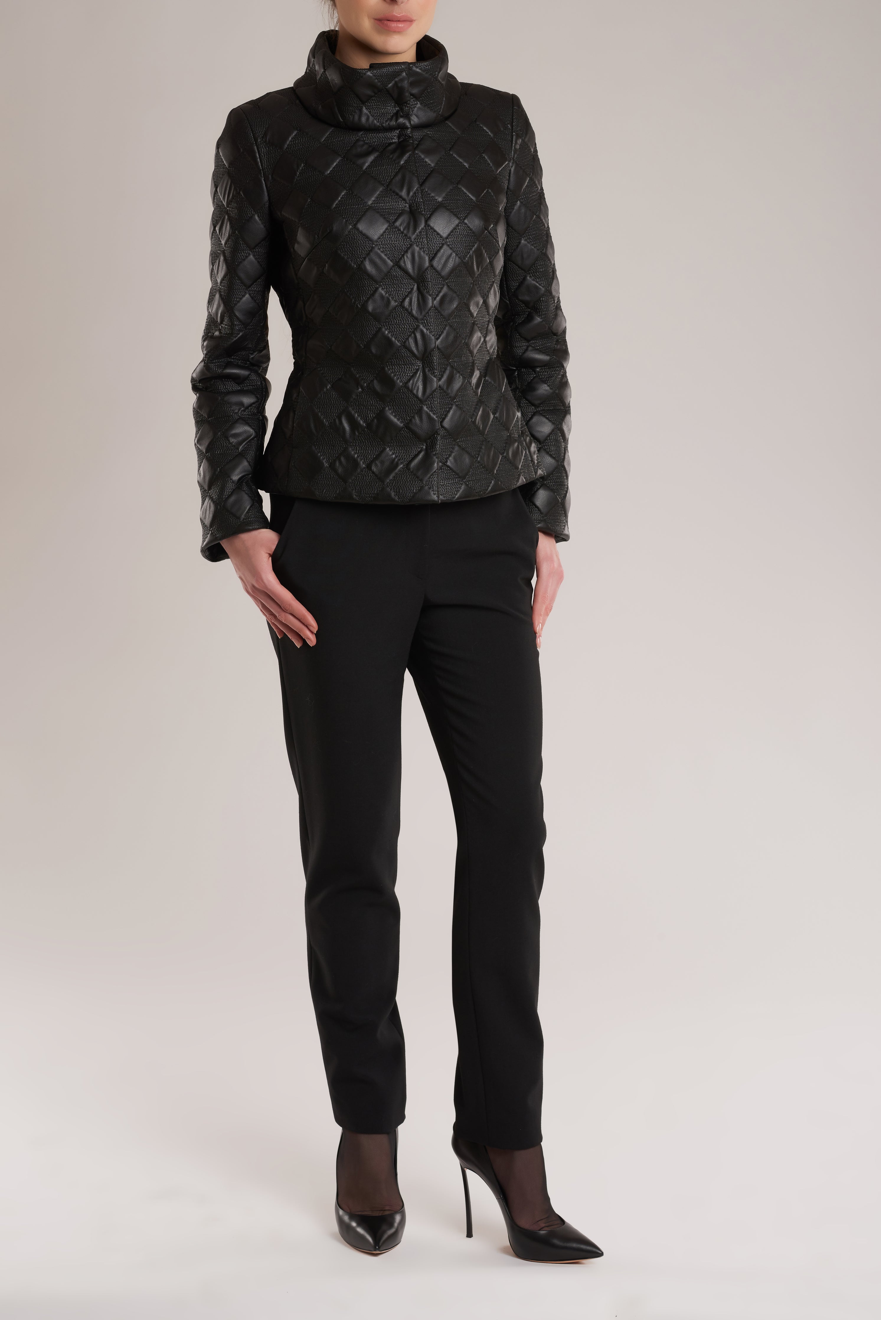 GINTA's black jacket is tailored from exquisite square-shaped quilted artificial leather.